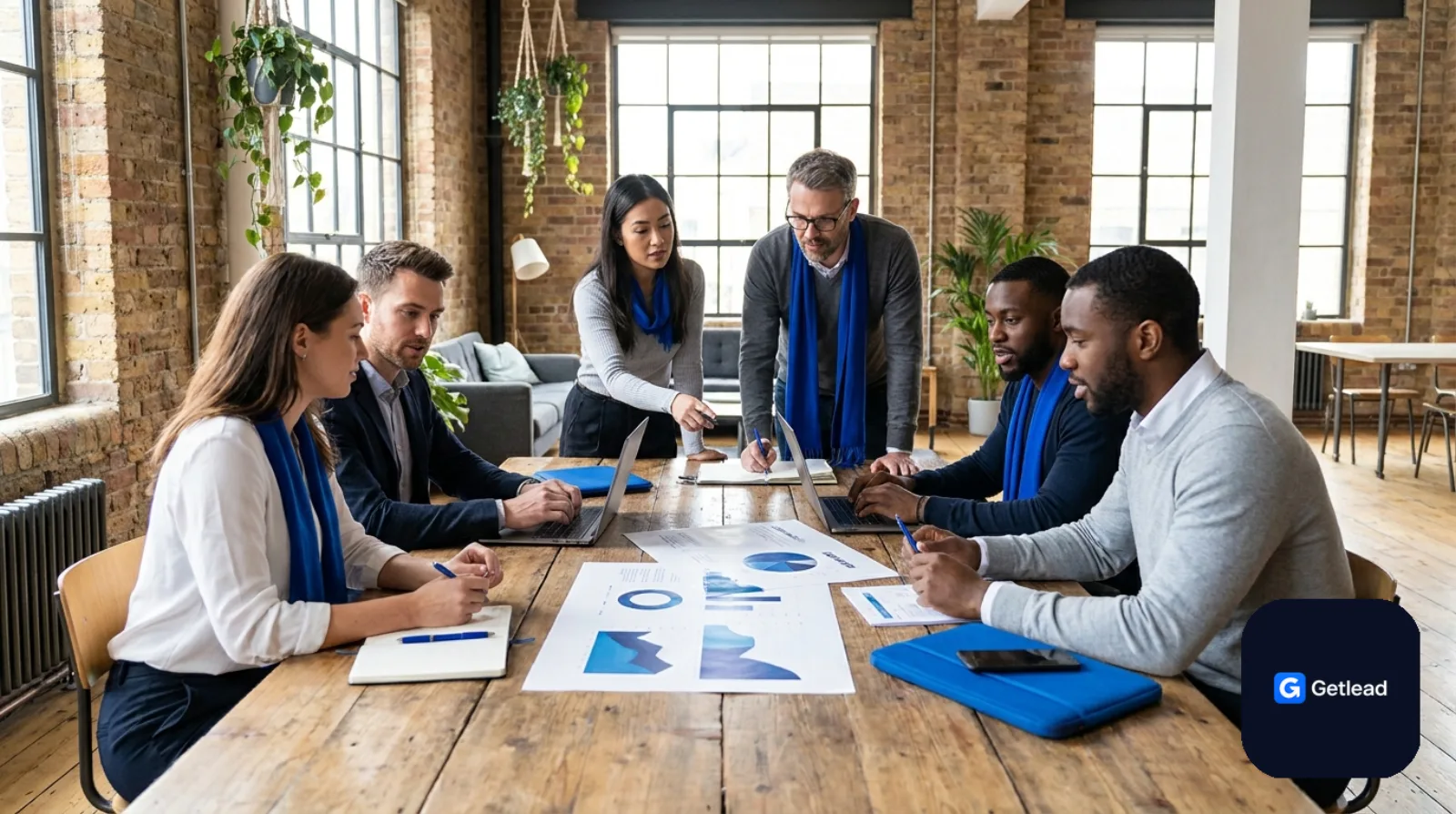Marketing agency team collaborating in a modern loft office